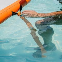 MarineWarehouse/Mission-REEF-Inflatable-Stirrup-Step-installed-with-person-using-it__38666.1739477272